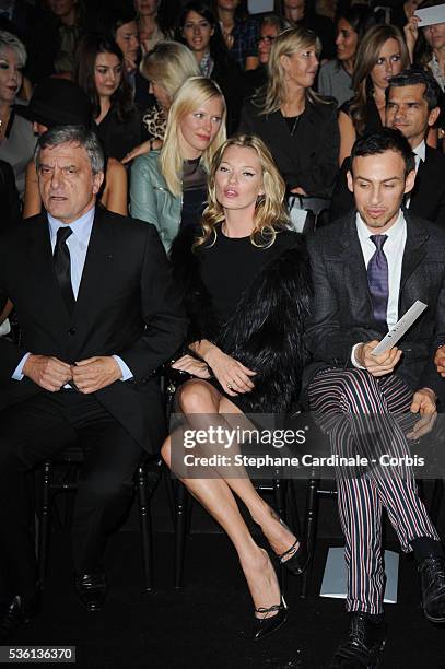 Sidney Toledano, Kate Moss and Alexis Roche attend the Christian Dior show as part of Paris Fashion Week Spring/Summer 2011 in Paris.