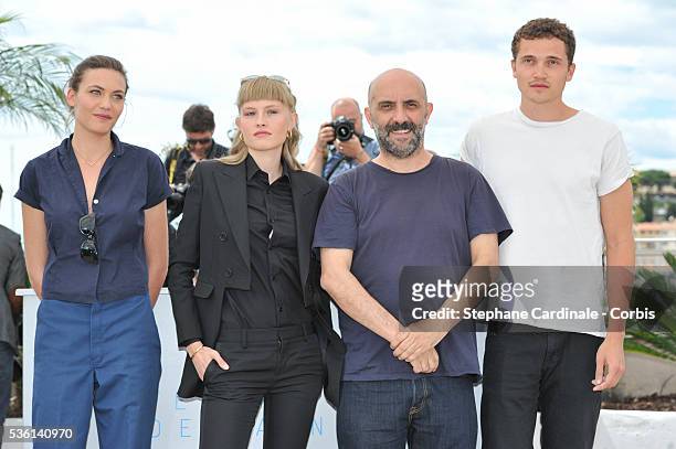Klara Kirstin, Gaspar Noe, Karl Glusman and Aomi Muyock attends the "Love" Photocall during the 68th Cannes Film Festival, on May 21, 2015 in Cannes,...