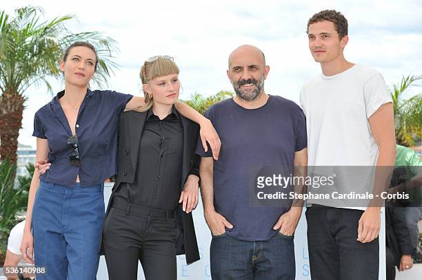 Klara Kirstin, Gaspar Noe, Karl Glusman and Aomi Muyock attends the "Love" Photocall during the 68th Cannes Film Festival, on May 21, 2015 in Cannes,...
