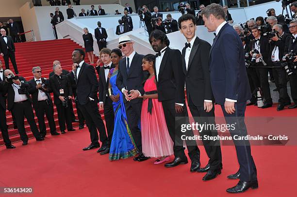 Jesuthasan Antonythasan, Claudine Vinasithamby, Jacques Audiard, Kalieaswari Srinivasan, Vincent Rottiers and Marc Zinga attend the Premiere of...