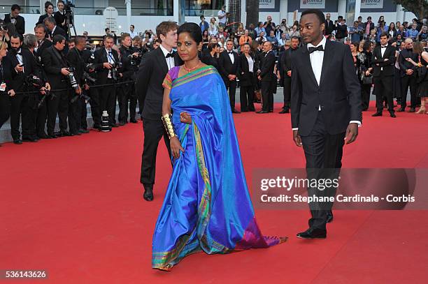 Kalieaswari Srinivasan and Marc Zinga attend the Premiere of 'Dheepan' during the 68th Cannes Film Festival, on May 21, 2015 in Cannes, France.