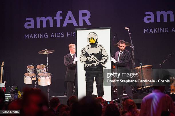 Leonardo DiCaprio's Banksi art painting during amfAR's 22nd Cinema Against AIDS Gala, Presented By Bold Films And Harry Winston at Hotel du...