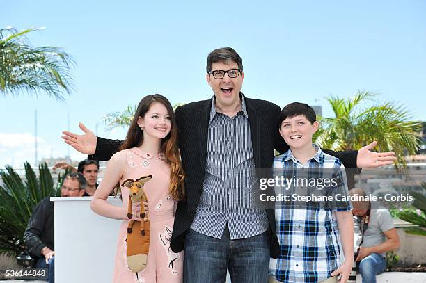 Mackenzie Foy, Mark Osborne and Riley Osborne attend the 'The Little Prince' Photocall during the 68th annual Cannes Film Festival on May 22, 2015