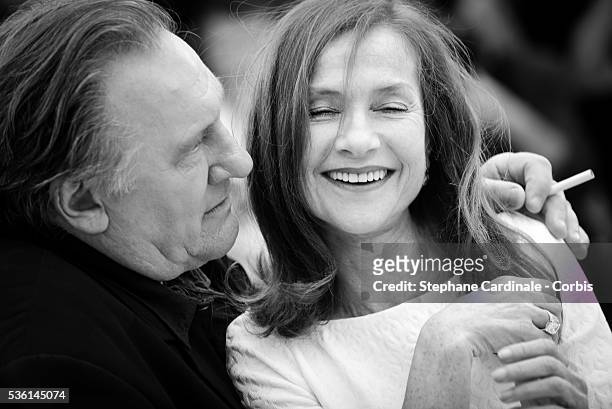 Gerard Depardieu and Isabelle Huppert attend the 'Valley Of Love' Photocall during the 68th annual Cannes Film Festival on May 22, 2015
