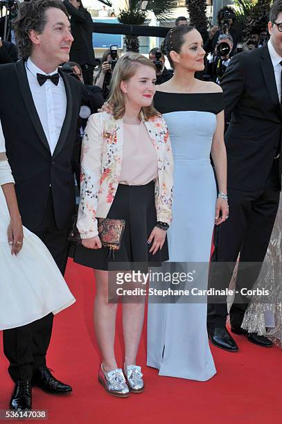 Guillaume Galienne, Mackenzie Foy and Marion Cotillard attends the 'The Little Prince' premiere during the 68th annual Cannes Film Festival on May...
