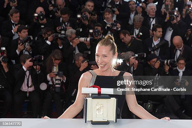 Actress Emmanuelle Bercot, winner of the Best Performance by an Actress award for her performance in 'Mon Roi' attends a photocall as winner of the...