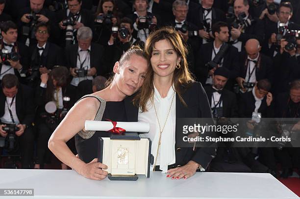 Actress Emmanuelle Bercot , winner of the Best Performance by an Actress award for her performance in 'Mon Roi' poses with Maiwenn during a photocall...