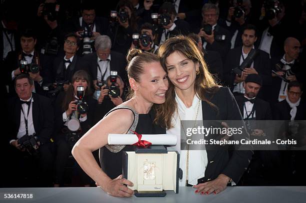 Actress Emmanuelle Bercot , winner of the Best Performance by an Actress award for her performance in 'Mon Roi' poses with Maiwenn during a photocall...