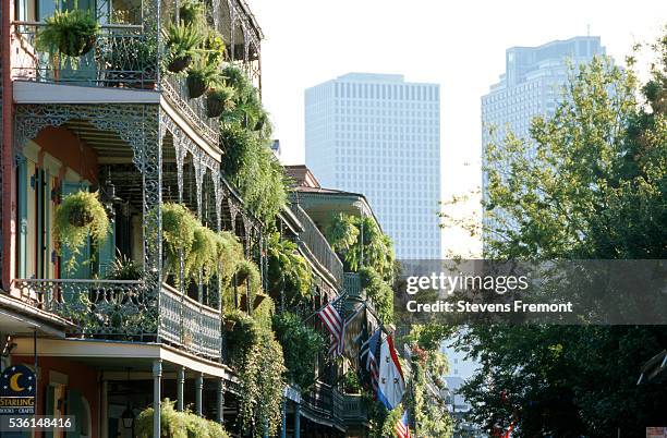 row homes along the royal street in the french quarter - royal street imagens e fotografias de stock