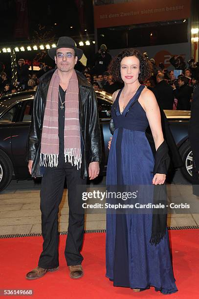 Maria Schrader and guest attend the 'True Grit' Premiere, during the 61st Berlin Film Festival at Berlinale Palace.