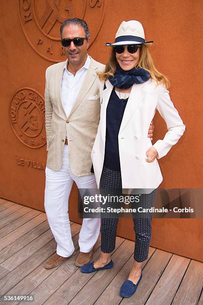 Marisa Berenson and Jean-Michel Simonian attend the 2015 Roland Garros French Tennis Open - Day Three, on May 26, 2015 in Paris, France.