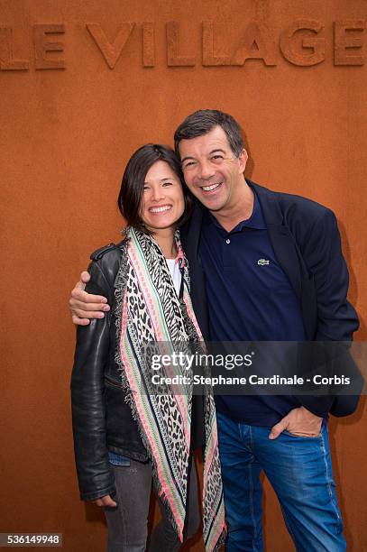 Flavie Pean and Stephane Plaza attend the 2015 Roland Garros French Tennis Open - Day Three, on May 26, 2015 in Paris, France.