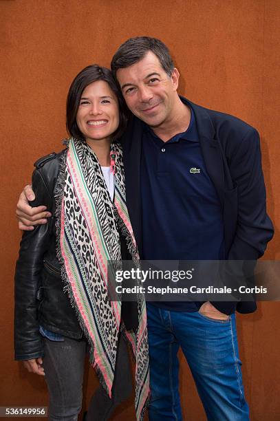 Flavie Pean and Stephane Plaza attend the 2015 Roland Garros French Tennis Open - Day Three, on May 26, 2015 in Paris, France.