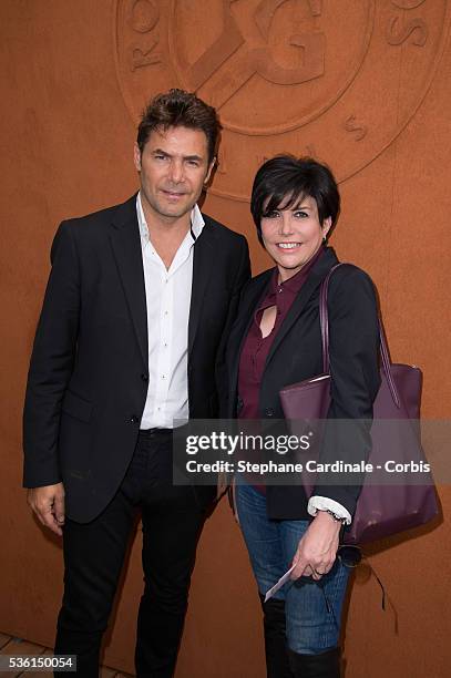 Liane Foly with Producer Laurent Baron attend the 2015 Roland Garros French Tennis Open - Day Three, on May 26, 2015 in Paris, France.