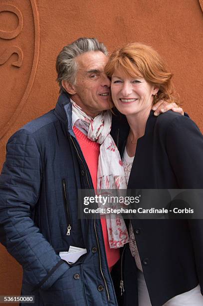 Gerard Holtz and Murielle Mayette attend the 2015 Roland Garros French Tennis Open - Day Three, on May 26, 2015 in Paris, France.