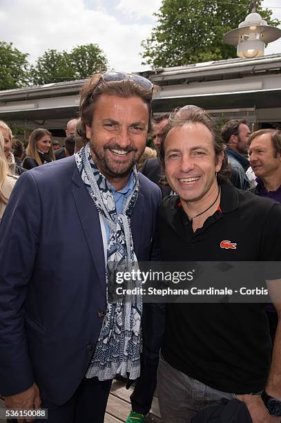 Henri Leconte and Philippe Candeloro attend the 2015 Roland Garros French Tennis Open - Day Three, on May 26, 2015 in Paris, France.