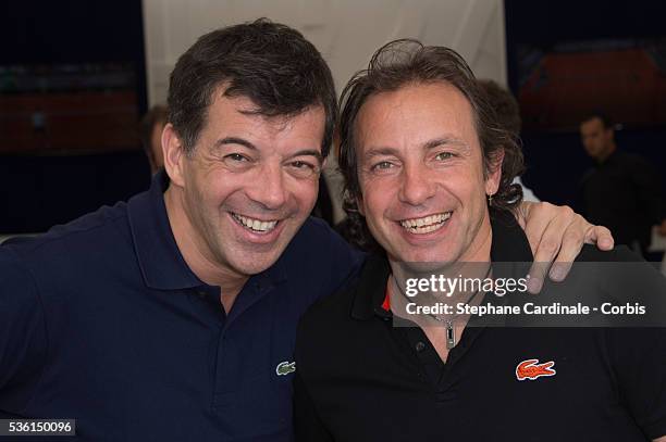 Stephane Plaza and Philippe Candeloro attend the 2015 Roland Garros French Tennis Open - Day Three, on May 26, 2015 in Paris, France.