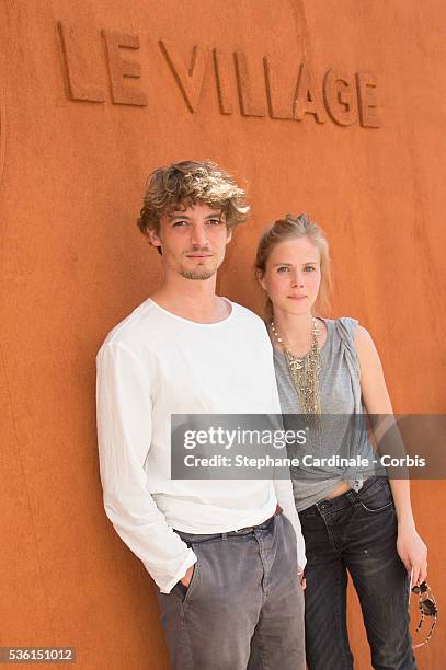 Niels Schneider and Tatiana Verstraeten attend the 2015 Roland Garros French Tennis Open - Day Seven, on May 30, 2015 in Paris, France.