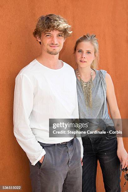 Niels Schneider and Tatiana Verstraeten attend the 2015 Roland Garros French Tennis Open - Day Seven, on May 30, 2015 in Paris, France.