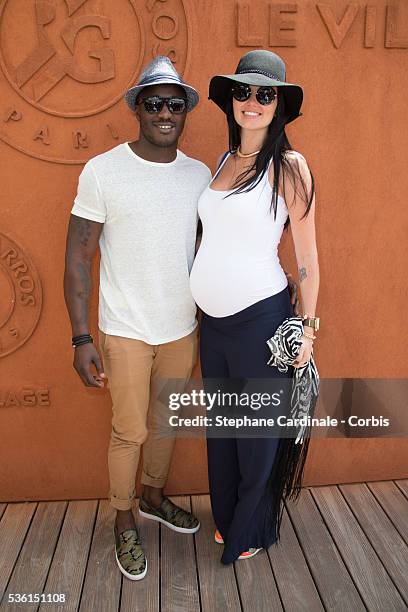 Djibril Camara and his wife Julie attend the 2015 Roland Garros French Tennis Open - Day Seven, on May 30, 2015 in Paris, France.