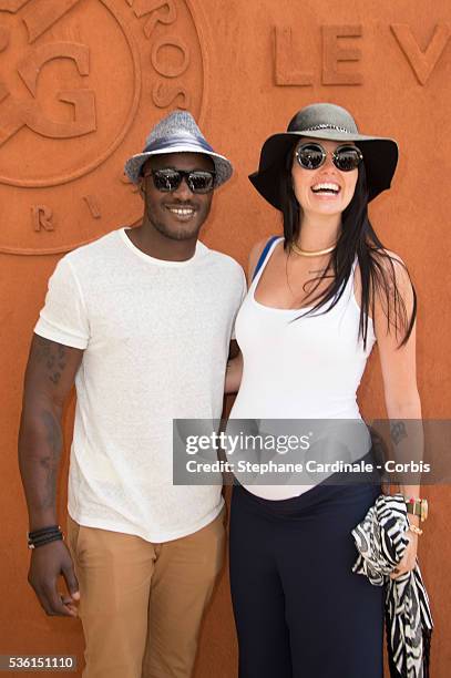 Djibril Camara and his wife Julie attend the 2015 Roland Garros French Tennis Open - Day Seven, on May 30, 2015 in Paris, France.