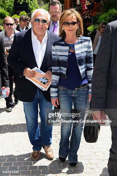 Dominique Strauss Kahn and Myriam L'Aouffir attend the 2015 Roland Garros French Tennis Open - Day Seven, on May 30, 2015 in Paris, France.