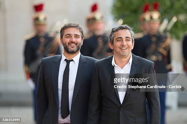 Directors Olivier Nakache and Eric Toledano arrive at the State Dinner offered by French President François Hollande at the Elysee Palace on June 2,...