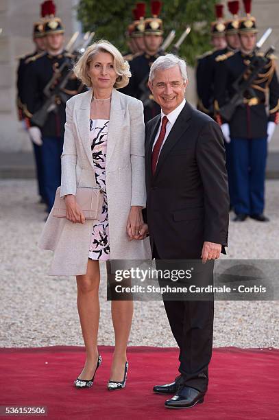 President of National Assembly Claude Bartolone and his Wife arrive at the State Dinner offered by French President François Hollande at the Elysee...