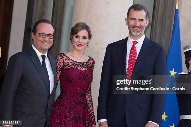 President of France François Hollande, Her Majesty The Queen Letizia of Spain and His Majesty The King Felipe VI of Spain pose before the State...