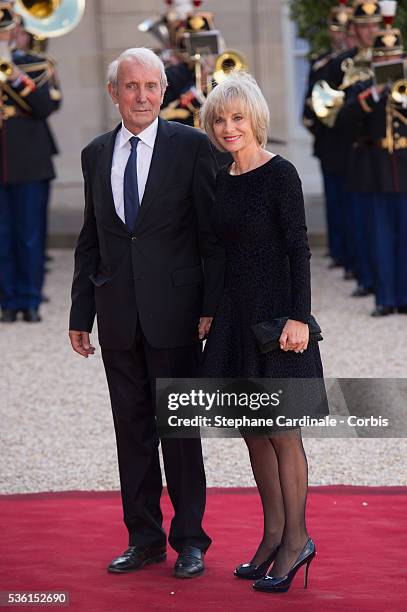 Elizabeth Guigou and her husband arrive at the State Dinner offered by French President François Hollande at the Elysee Palace on June 2, 2015 in...