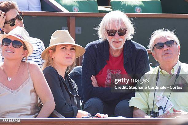 Julie Gayet and Pierre Richard attend the 2015 Roland Garros French Tennis Open - Day Eleven, on June 3, 2015 in Paris, France.