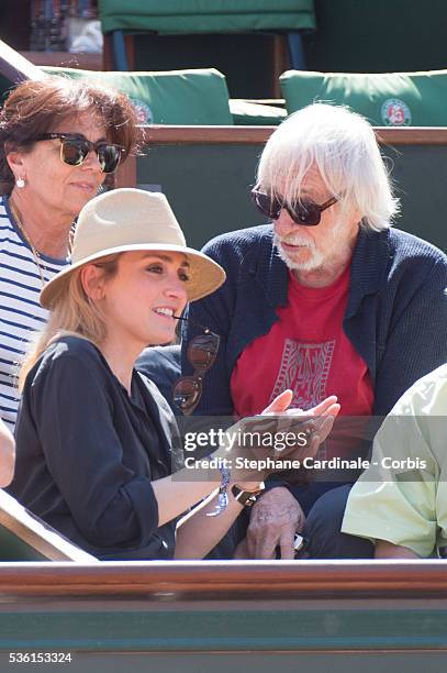 Julie Gayet and Pierre Richard attend the 2015 Roland Garros French Tennis Open - Day Twelve, on June 4, 2015 in Paris, France.