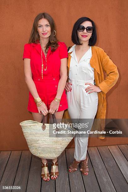 Aurelie Saada and Sylvie Hoarau from the Music Band 'Brigitte' attend the 2015 Roland Garros French Tennis Open - Day Twelve, on June 4, 2015 in...