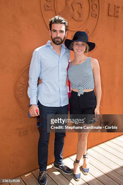 Alice Isaaz and guest attend the 2015 Roland Garros French Tennis Open - Day Twelve, on June 4, 2015 in Paris, France.