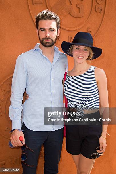 Alice Isaaz and guest attend the 2015 Roland Garros French Tennis Open - Day Twelve, on June 4, 2015 in Paris, France.