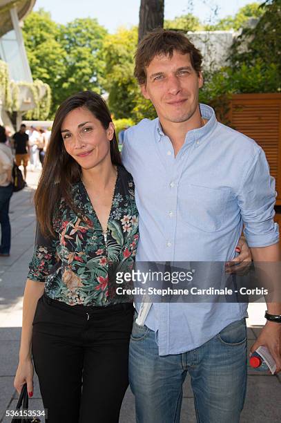 Cedric Jimenez and Audrey Diwan attend the 2015 Roland Garros French Tennis Open - Day Twelve, on June 4, 2015 in Paris, France.