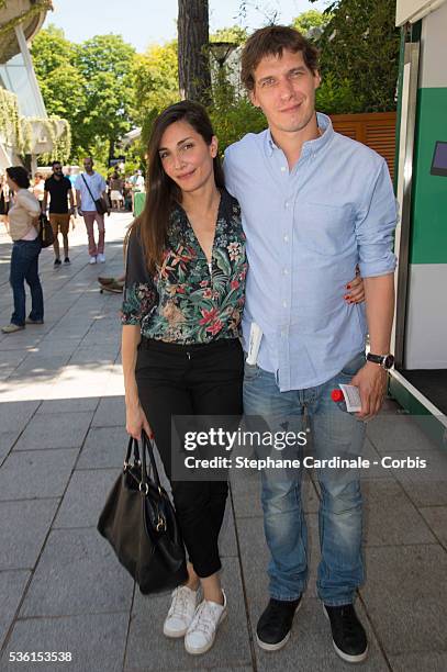 Cedric Jimenez and Audrey Diwan attend the 2015 Roland Garros French Tennis Open - Day Twelve, on June 4, 2015 in Paris, France.