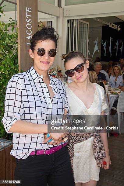 Melanie Doutey and Sara Forestier attend the 2015 Roland Garros French Tennis Open - Day Fourteen, on June 6, 2015 in Paris, France.
