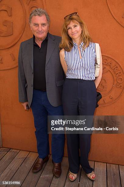Actress Florence Pernel and her husband Patrick Rothman attend the Men's Singles Final of 2015 Roland Garros French Tennis Open - Day Fithteen, on...