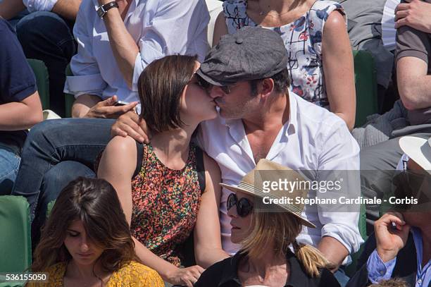 Nathalie Pechalat and Jean Dujardin attend the Men's Singles Final of 2015 Roland Garros French Tennis Open - Day Fithteen, on June 7, 2015 in Paris,...