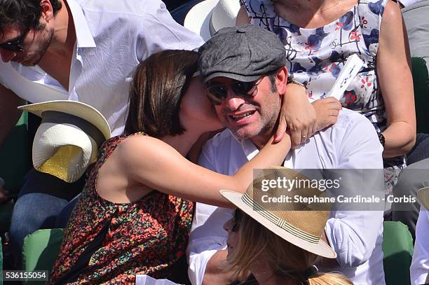 Nathalie Pechalat and Jean Dujardin attend the Men's Singles Final of 2015 Roland Garros French Tennis Open - Day Fithteen, on June 7, 2015 in Paris,...