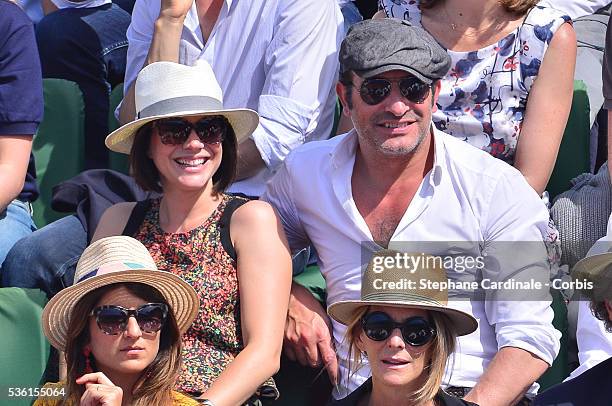 Nathalie Pechalat and Jean Dujardin attend the Men's Singles Final of 2015 Roland Garros French Tennis Open - Day Fithteen, on June 7, 2015 in Paris,...