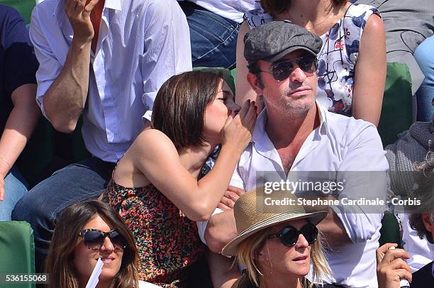 Nathalie Pechalat and Jean Dujardin attend the Men's Singles Final of 2015 Roland Garros French Tennis Open - Day Fithteen, on June 7, 2015 in Paris,...