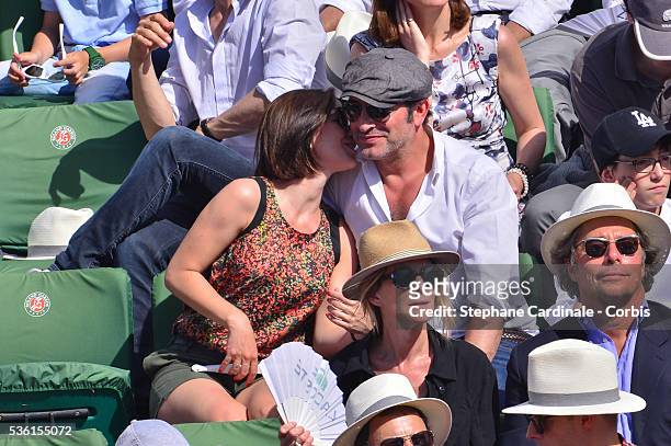 Nathalie Pechalat and Jean Dujardin attend the Men's Singles Final of 2015 Roland Garros French Tennis Open - Day Fithteen, on June 7, 2015 in Paris,...