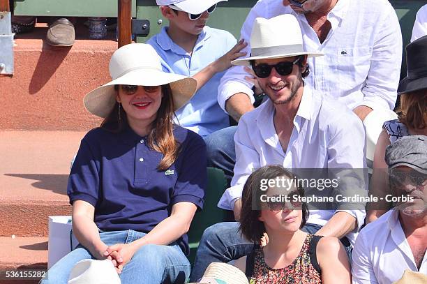 Jeremy Elkaim and Anais Demoustier attend the Men's Singles Final of 2015 Roland Garros French Tennis Open - Day Fithteen, on June 7, 2015 in Paris,...