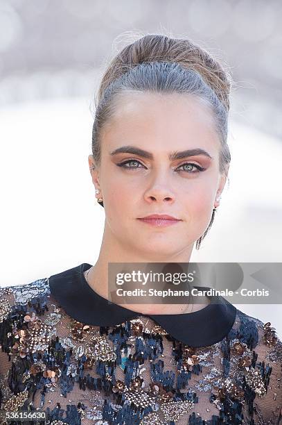 Cara Delevingne attends the photocall of the movie 'Paper Towns' on the Champs De Mars on June 17, 2015 in Paris, France.