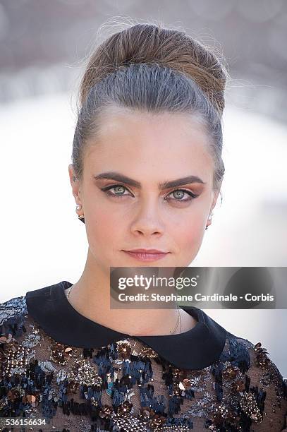 Cara Delevingne attends the photocall of the movie 'Paper Towns' on the Champs De Mars on June 17, 2015 in Paris, France.