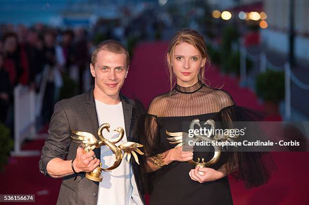 Kevin Azais poses with Josephine Japy during the closing Ceremony of the 29th Cabourg Romantic Film Festival on June 13, 2015 in Cabourg, France.