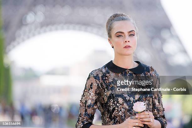 Cara Delevingne attends the photocall of the movie 'Paper Towns' on the Champs De Mars on June 17, 2015 in Paris, France.