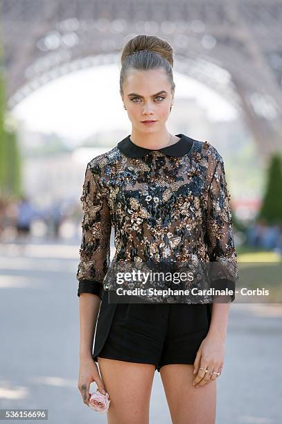 Cara Delevingne attends the photocall of the movie 'Paper Towns' on the Champs De Mars on June 17, 2015 in Paris, France.